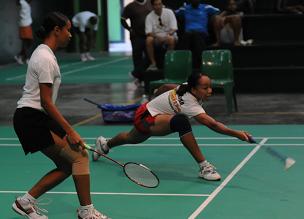 Paulin (right) won the ladies� singles against her doubles partner Course