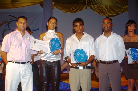 Young Female Athlete of the Year Camille (second left) and Young Male Athlete of the Year Mangroo (second right) pose with Cable & Wireless chief executive Hammond and Mr Dauban